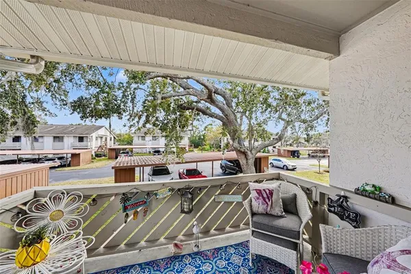 a view of an outdoor space with patio furniture