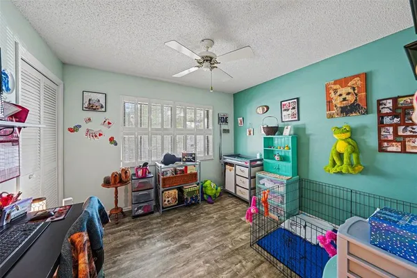 a bed room with furniture and a couch