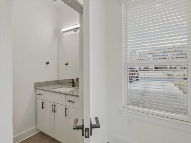 a kitchen with stainless steel appliances granite countertop a refrigerator a stove a sink and a microwave