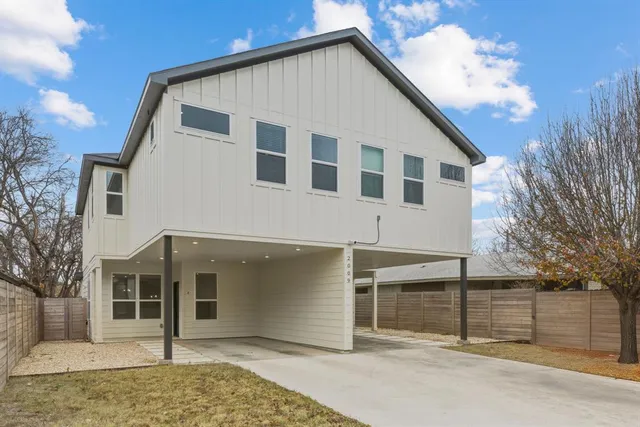 a view of a house with a garage