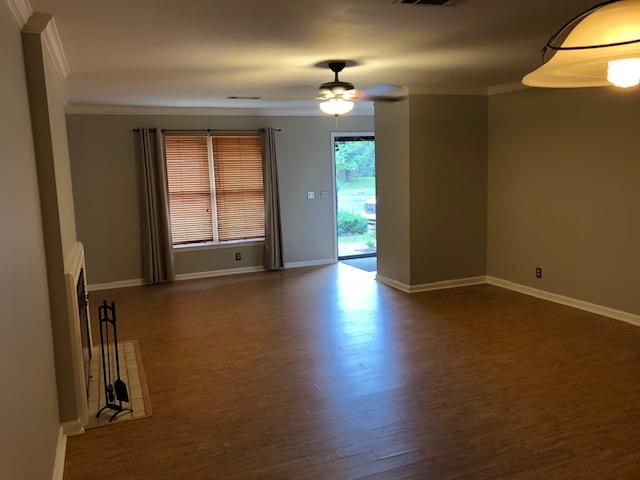 721 Kent Road Nashville, TN 37214 - Photo 3 of 10 an empty room with wooden floor and windows