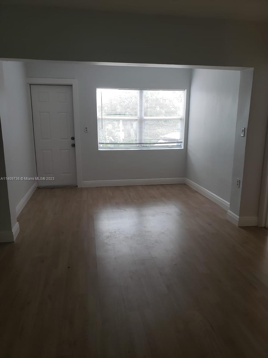2940 Southwest 38th Court, Unit 2942 Miami, FL 33134 - Photo 2 of 10 a view of room and window