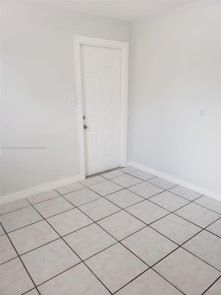 2940 Southwest 38th Court, Unit 2942 Miami, FL 33134 - Photo 9 of 10 a view of a room and utility area