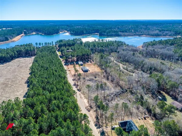 an aerial view of a residential houses and outdoor space