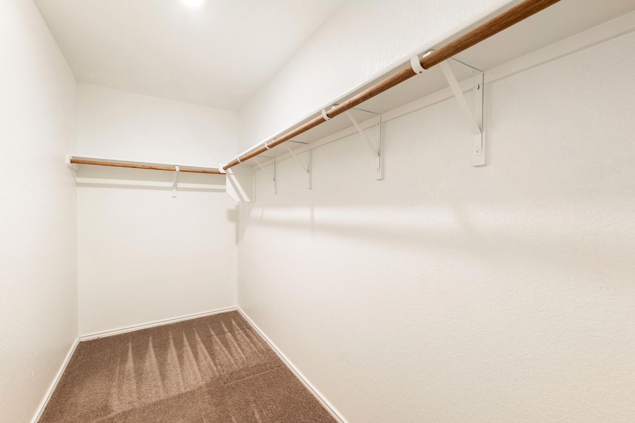 217 Innisfree Road Jarrell, TX 76537 - Photo 26 of 39 Ample storage solutions await in this naturally illuminated walk-in closet.