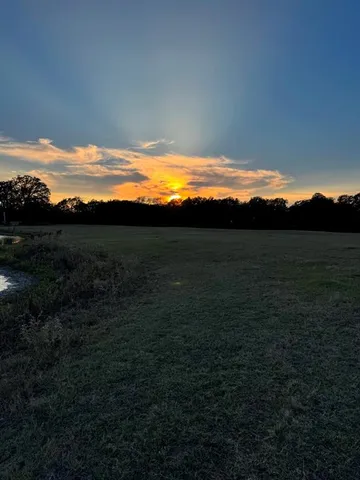 a view of lake with mountain