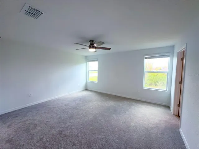 an empty room that has a window