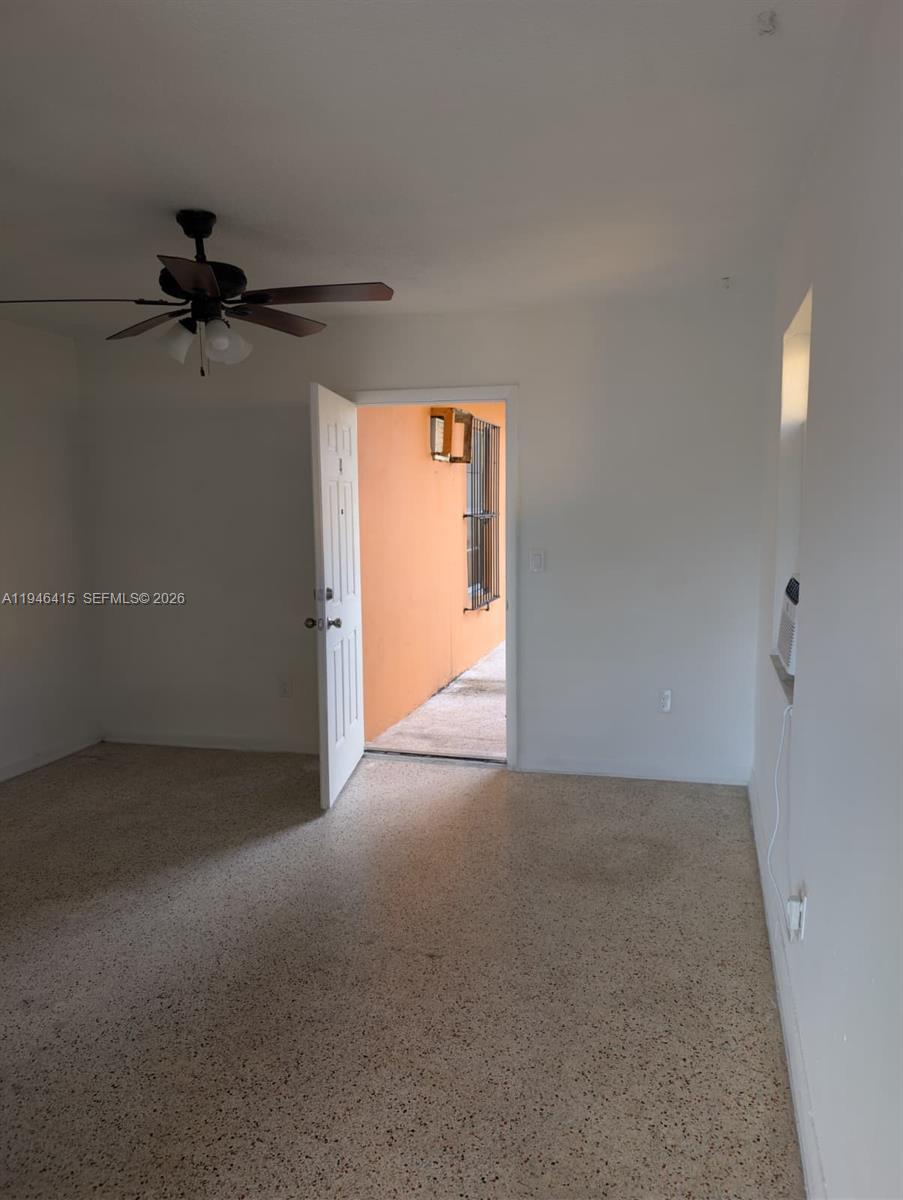 1461 Southwest 5th Street, Unit 4 Miami, FL 33135 - Photo 5 of 12 a view of a big room with a fan