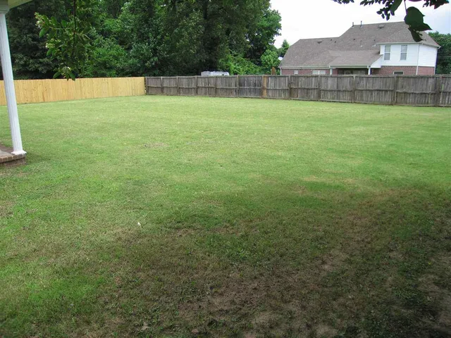 a view of outdoor space and yard