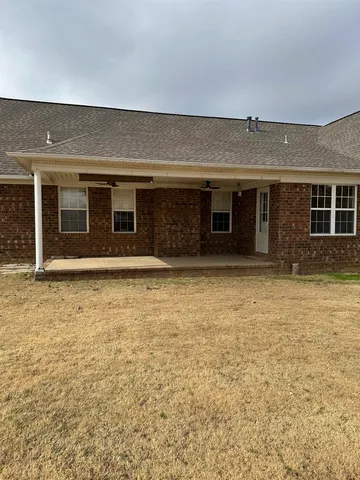 an outdoor view of house with yard