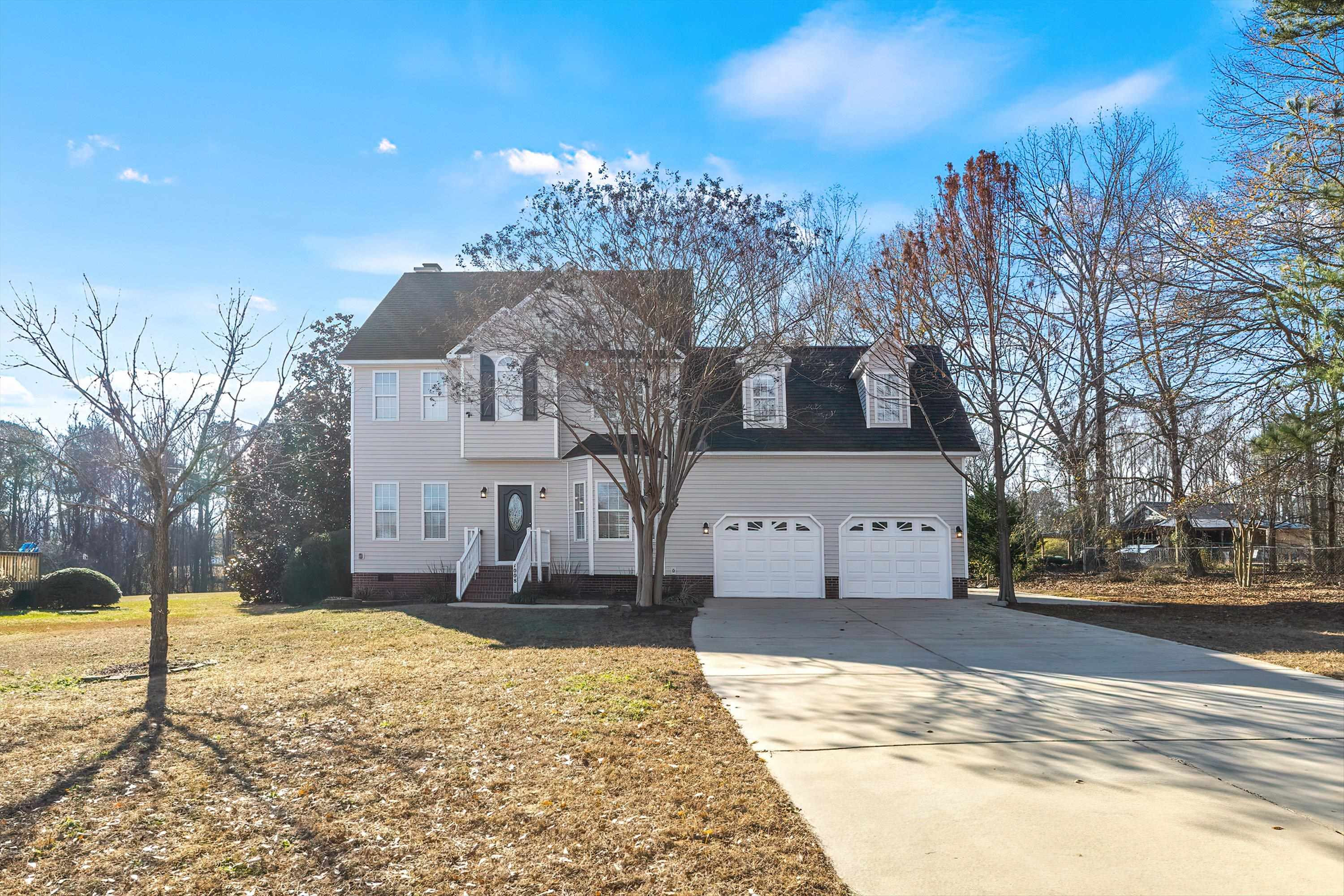 1008 Linden Crest Road Raleigh, NC 27603 - Photo 2 of 37 Beautiful home on gorgeous mature landscaped lot-new Architectural roof!