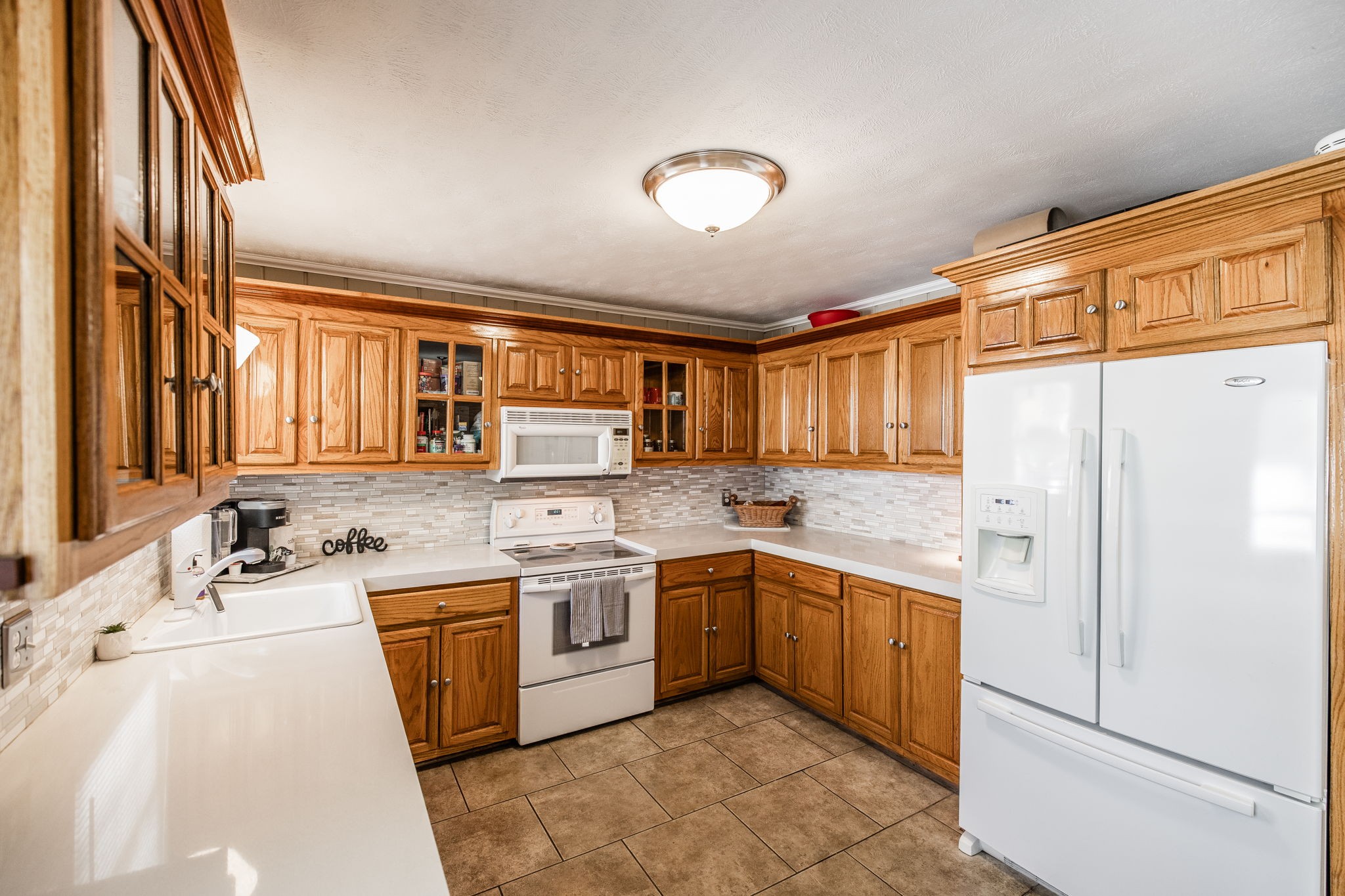 926 Hart Street Gallatin, TN 37066 - Photo 11 of 53 a kitchen with a sink refrigerator and cabinets