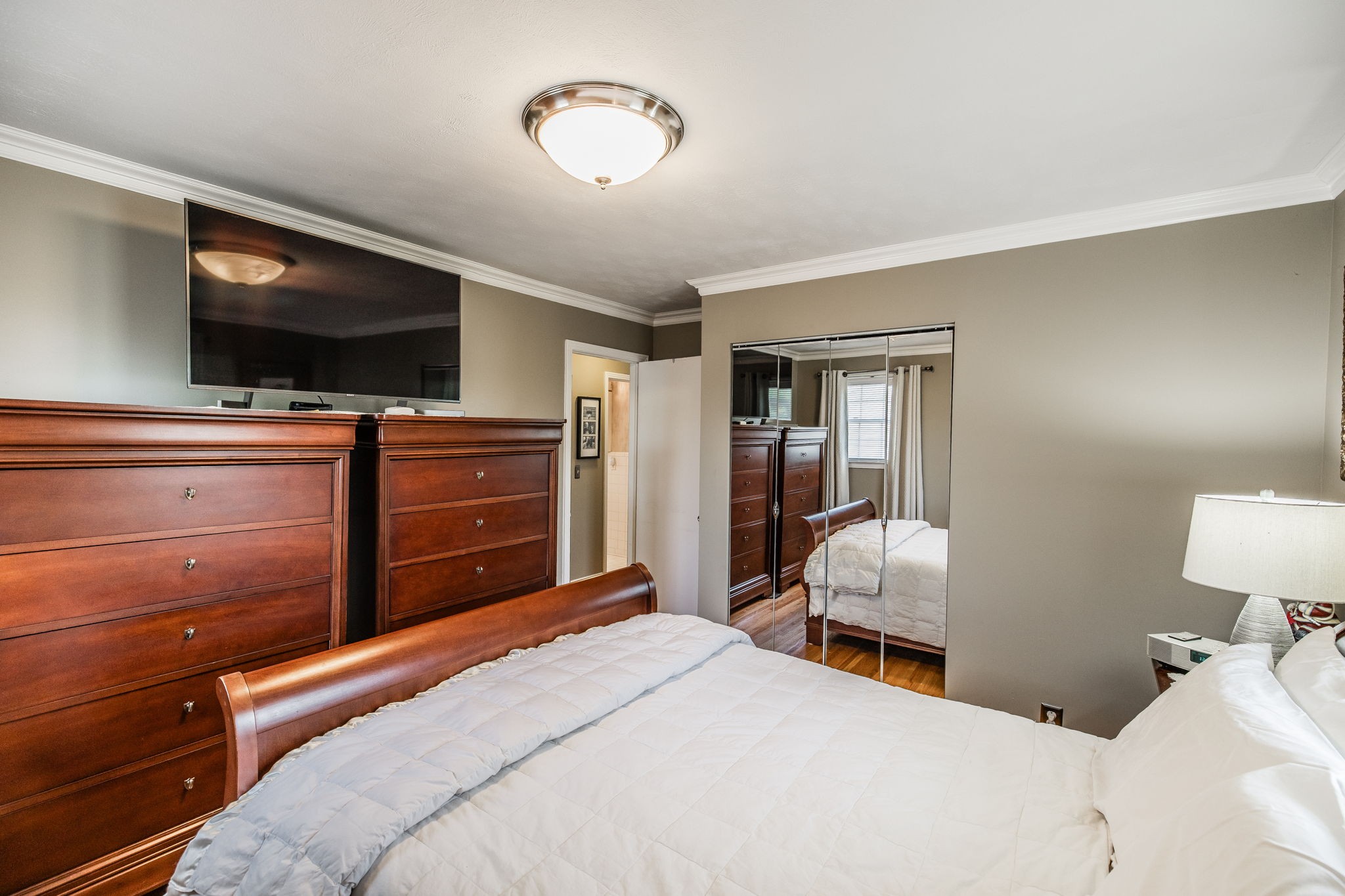 926 Hart Street Gallatin, TN 37066 - Photo 21 of 53 a bedroom with a bed and flat screen tv