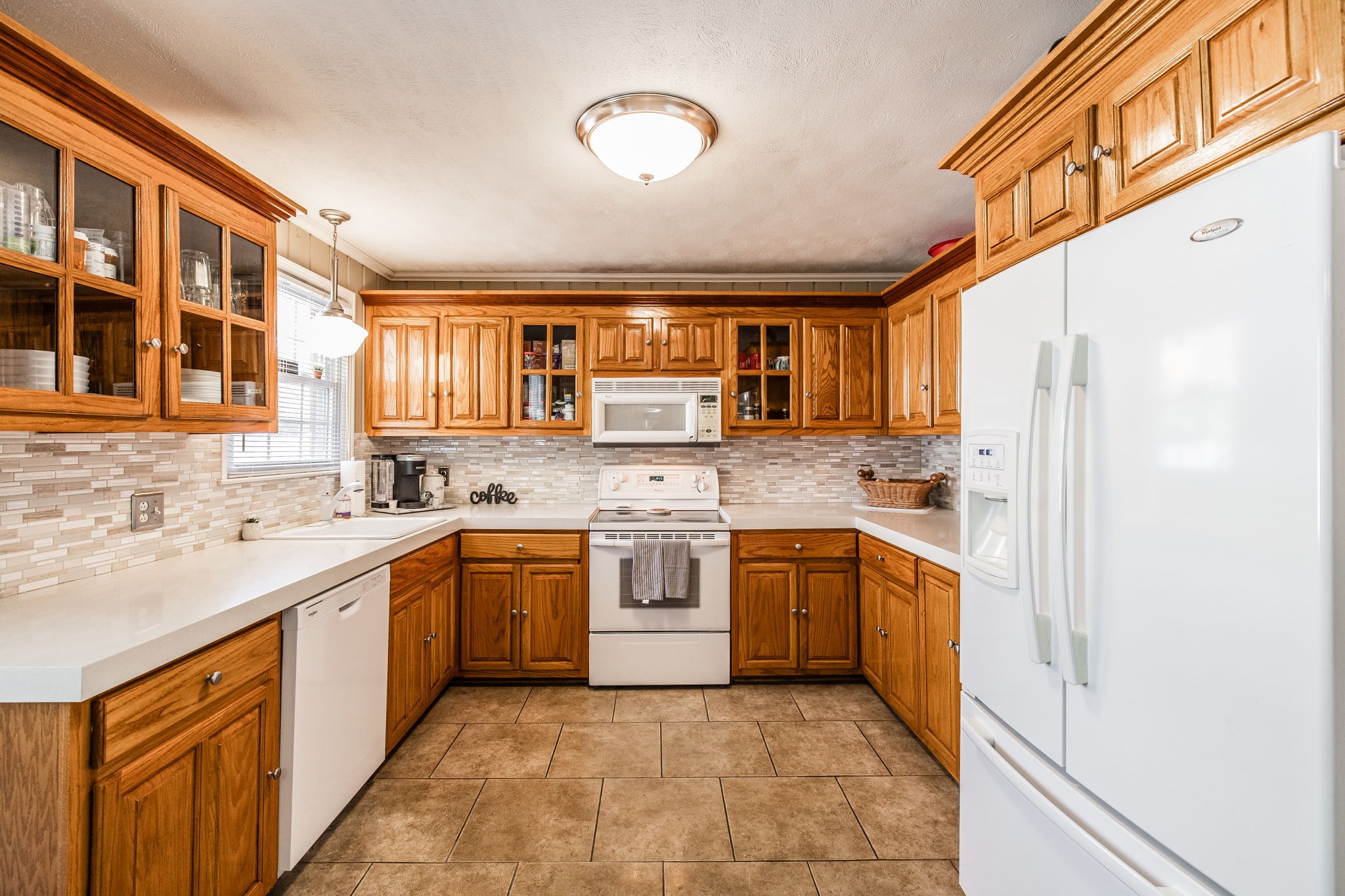 926 Hart Street Gallatin, TN 37066 - Photo 10 of 53 a kitchen with stainless steel appliances granite countertop a stove sink and cabinets