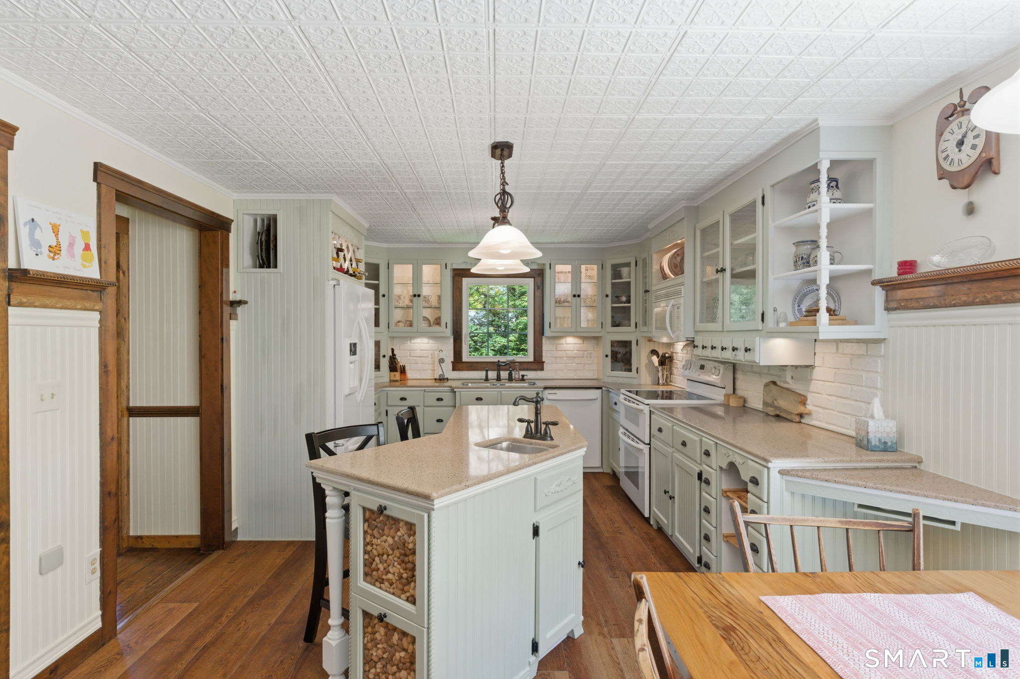 79 Buckboard Lane Bristol, CT 06010 - Photo 16 of 40 a kitchen with stainless steel appliances a sink stove and wooden floor