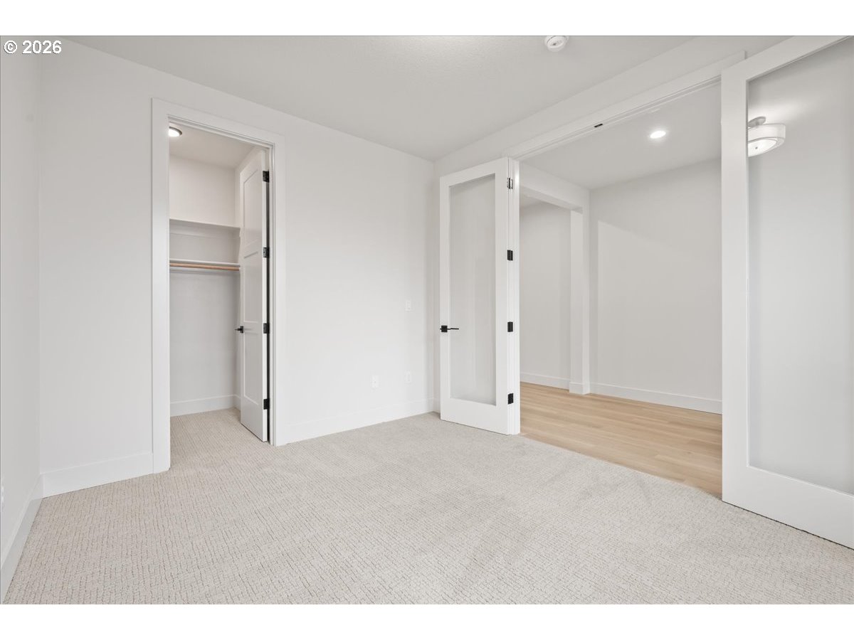 3509 North 11th Circle Ridgefield, WA 98642 - Photo 23 of 43 a view of an empty room