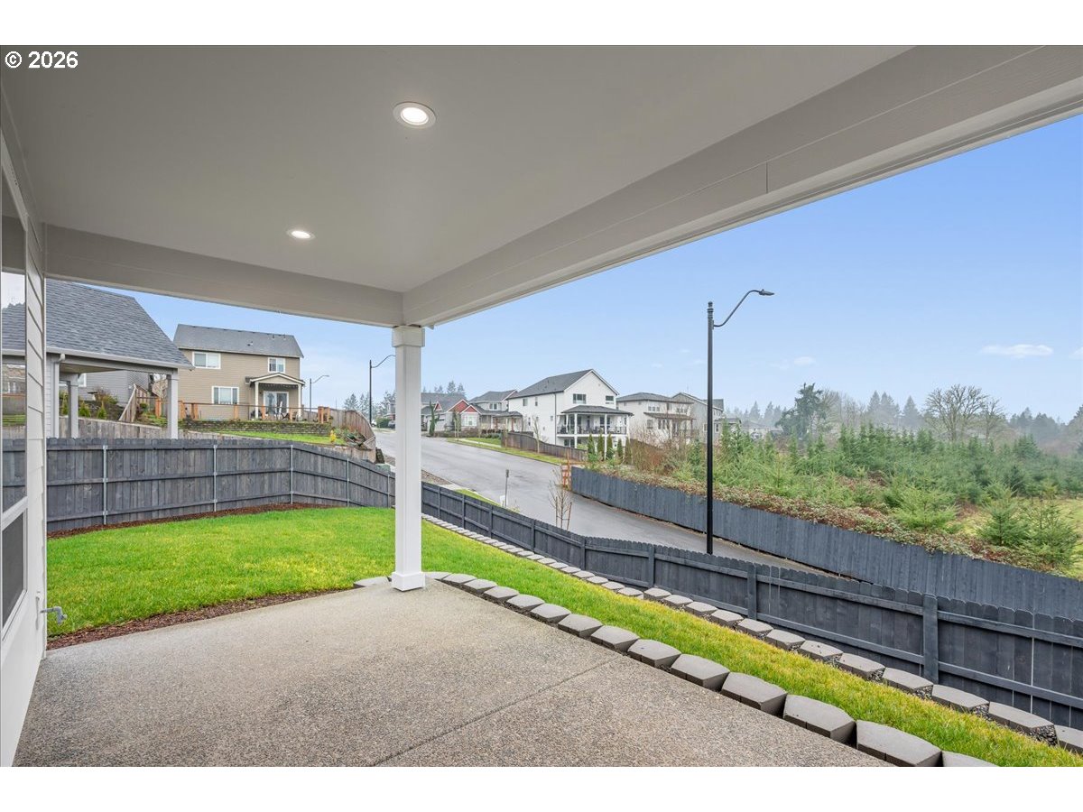 3509 North 11th Circle Ridgefield, WA 98642 - Photo 37 of 43 a view of a living room and kitchen with a large window