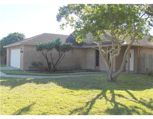 a view of swimming pool next to a yard