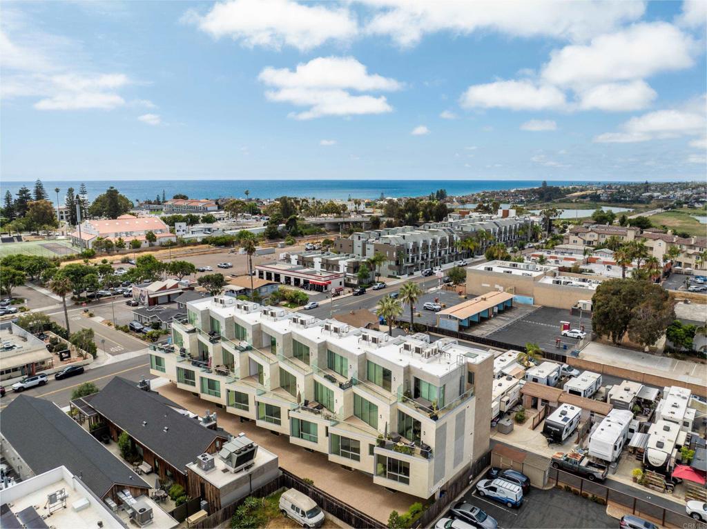 2648 State Street, Unit E Carlsbad, CA 92008 - Photo 21 of 24 an aerial view of a building with lots of residential buildings