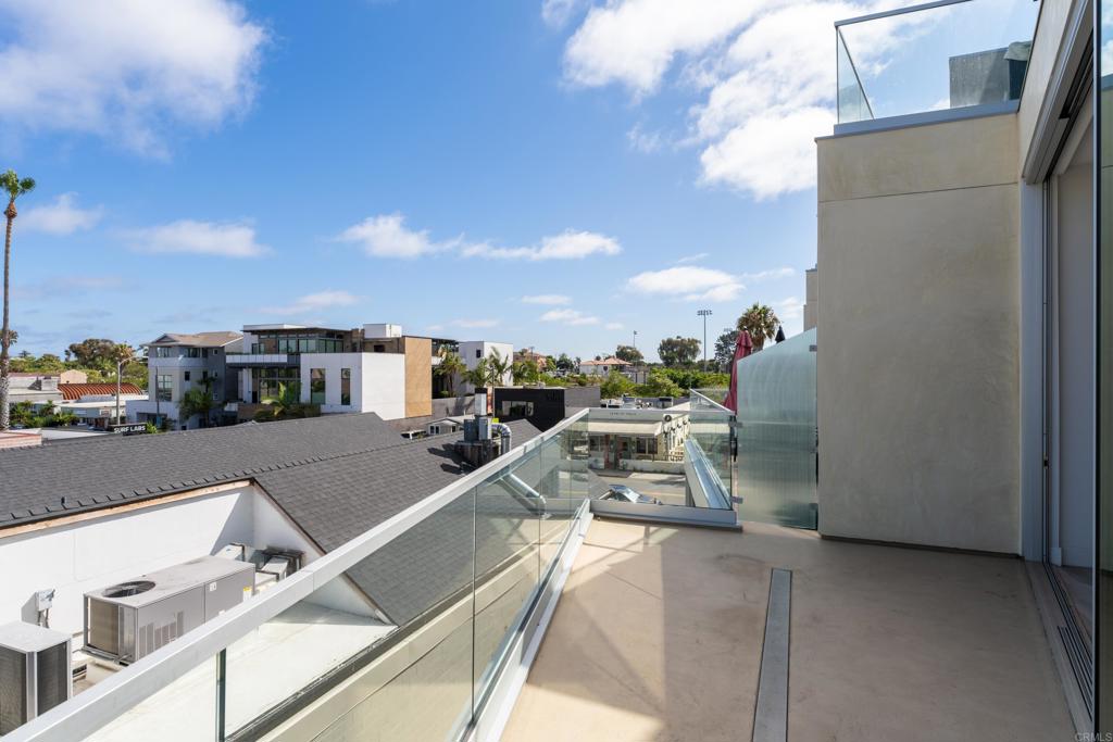2648 State Street, Unit E Carlsbad, CA 92008 - Photo 7 of 24 a view of a terrace with chairs