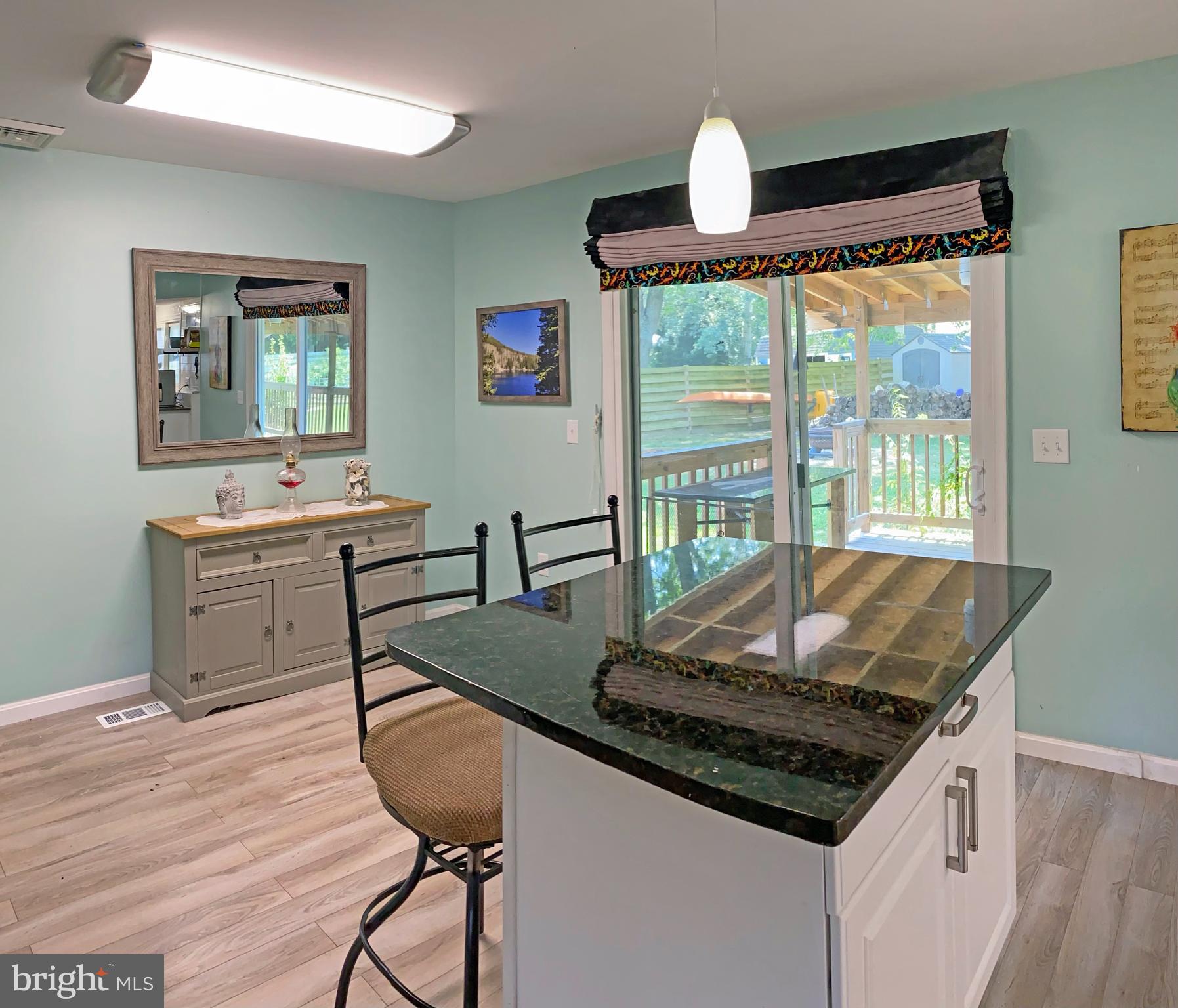 28098 Carpenter Road Milton, DE 19968 - Photo 11 of 35 Granite Breakfast Bar Island