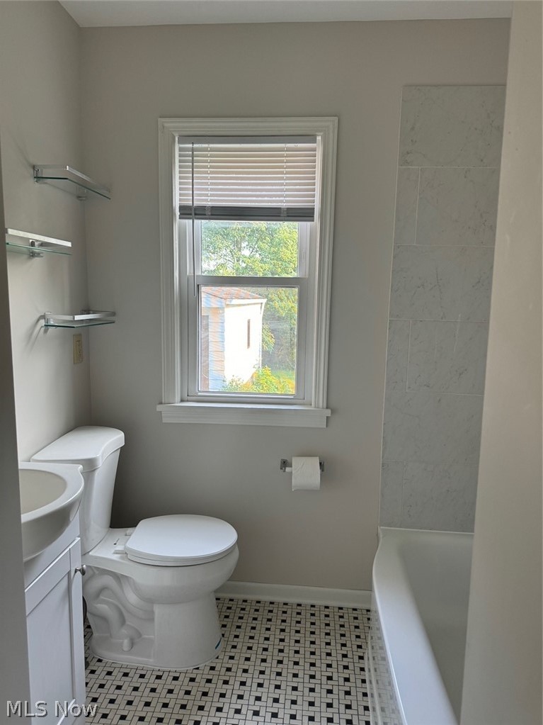 5671 Wellington Road Cleveland, OH 44124 - Photo 17 of 26 Bathroom featuring tile patterned floors, vanity, and toilet