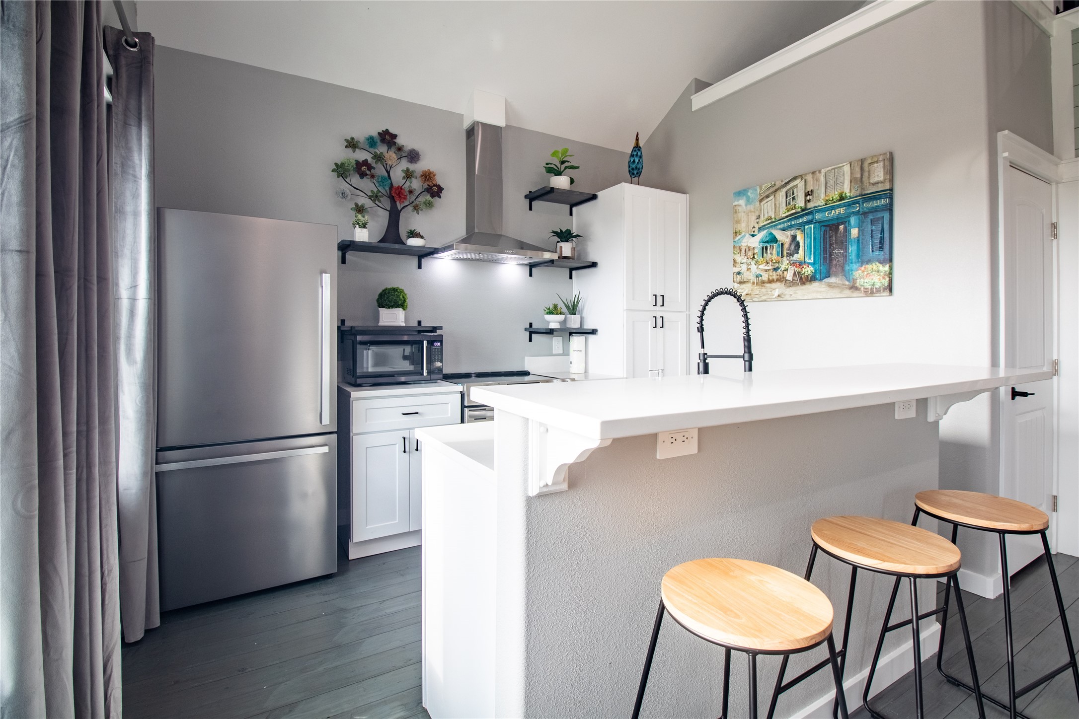 1040 Johnson Road Port Bolivar, TX 77650 - Photo 12 of 49 a kitchen with stainless steel appliances a refrigerator and a table chair