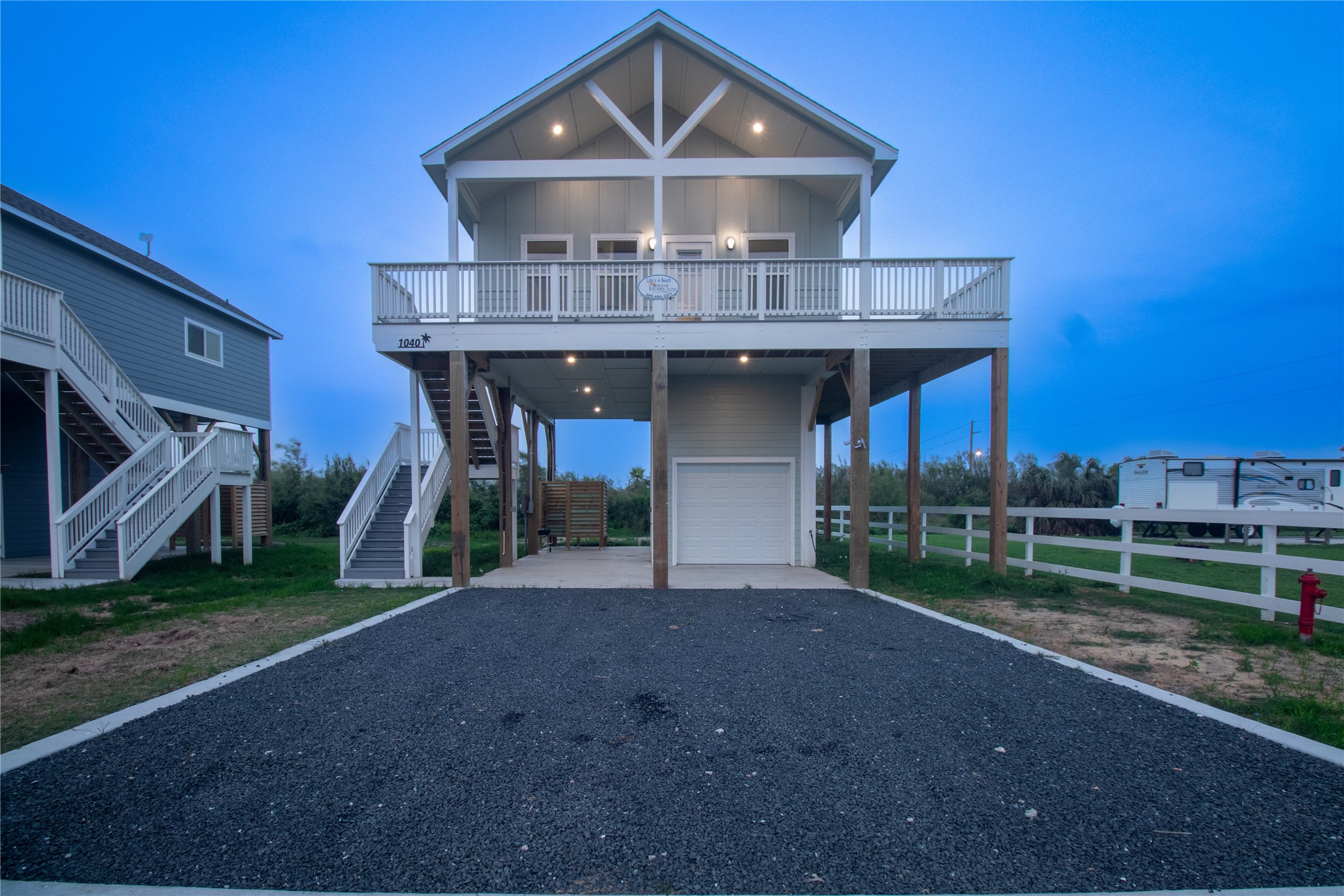 1040 Johnson Road Port Bolivar, TX 77650 - Photo 2 of 49 a front view of a house with yard