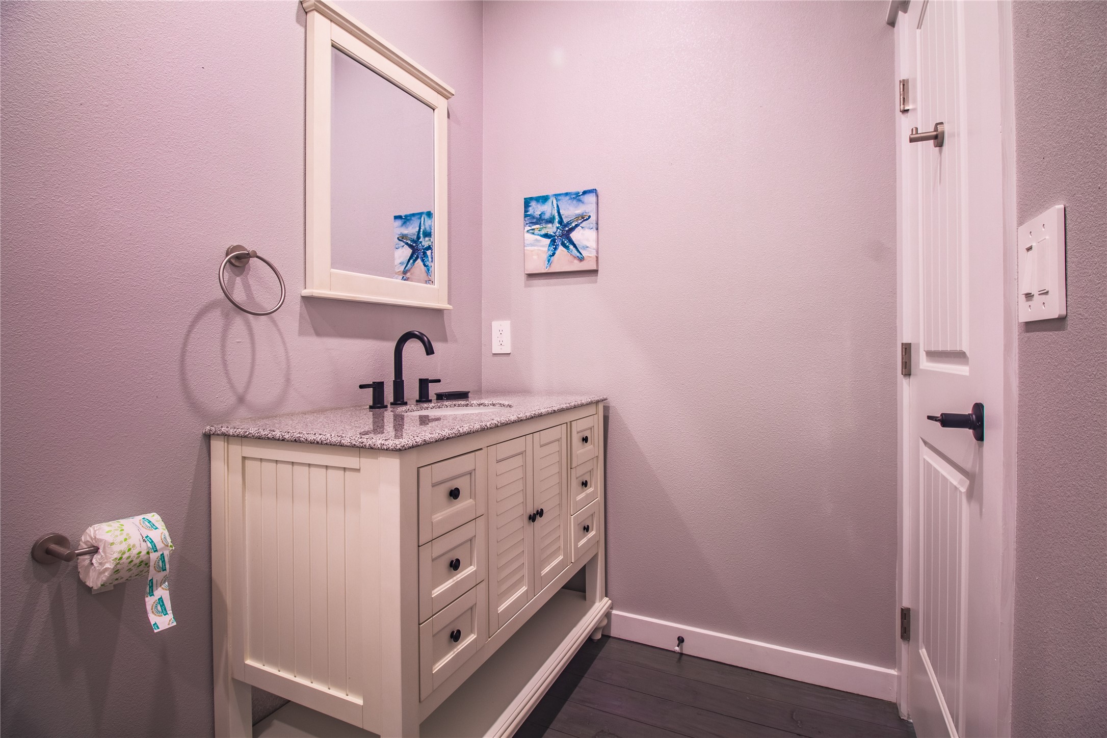 1040 Johnson Road Port Bolivar, TX 77650 - Photo 32 of 49 a bathroom with a sink vanity and a mirror