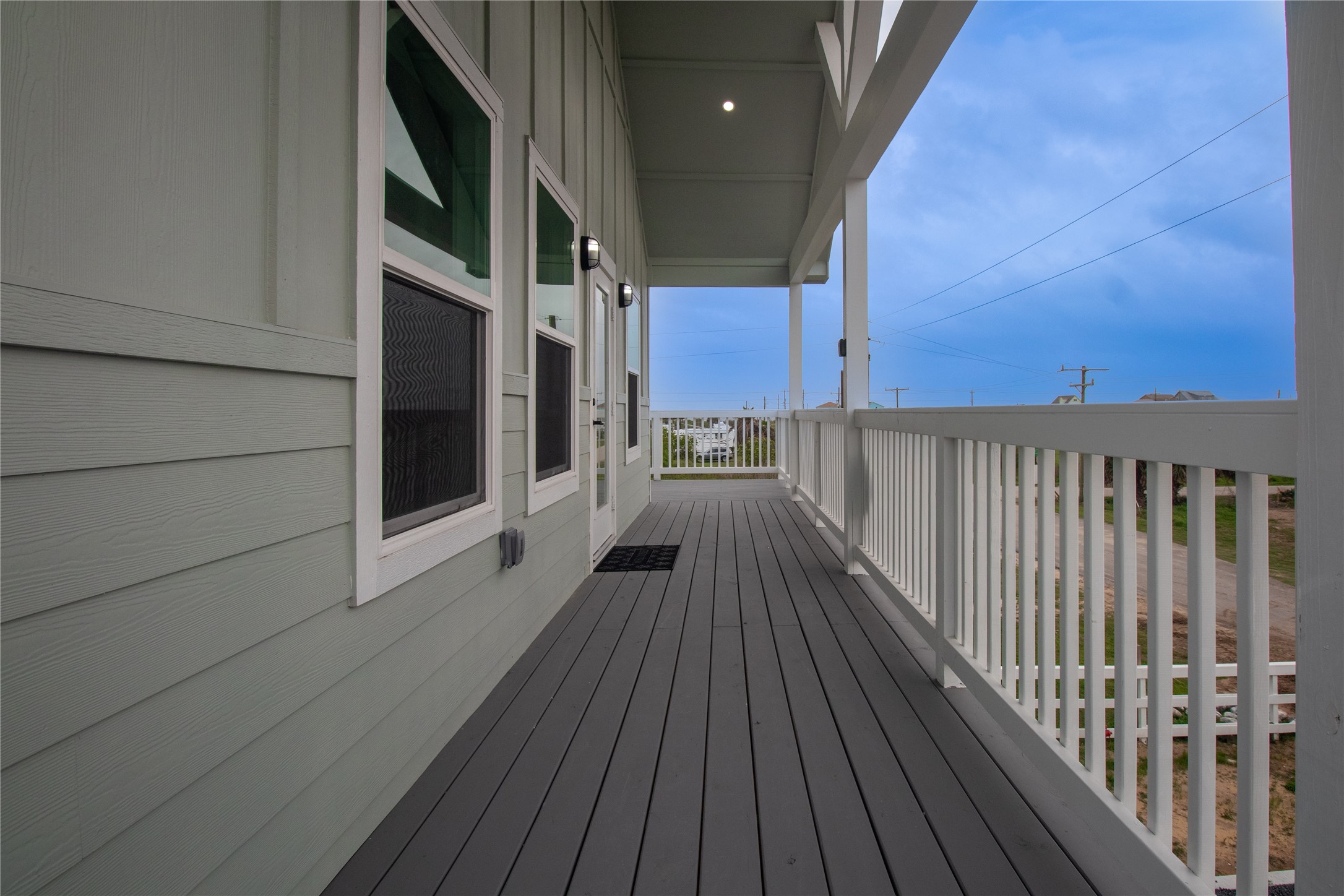 1040 Johnson Road Port Bolivar, TX 77650 - Photo 39 of 49 a view of a balcony with wooden floor