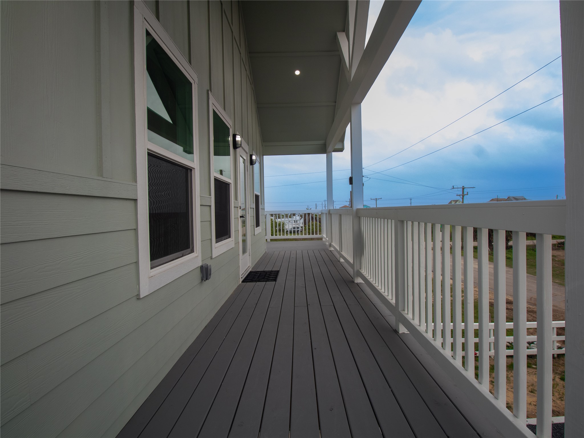 1040 Johnson Road Port Bolivar, TX 77650 - Photo 40 of 49 a view of balcony with wooden floor