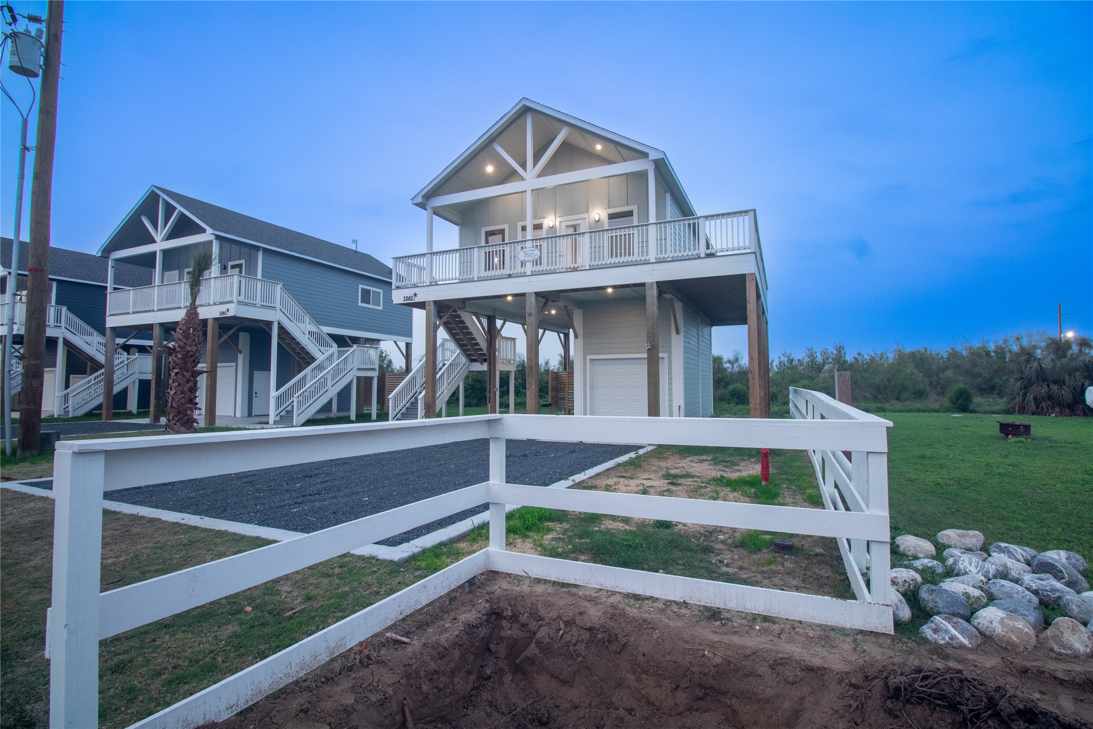 1040 Johnson Road Port Bolivar, TX 77650 - Photo 5 of 49 a front view of a house with garden