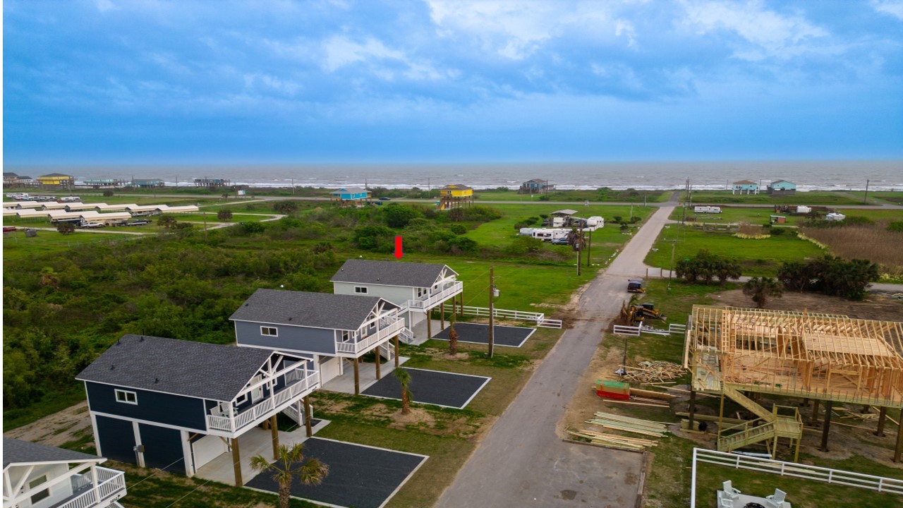 1040 Johnson Road Port Bolivar, TX 77650 - Photo 9 of 49 an aerial view of a house with a yard