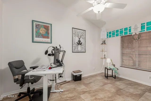 a view of a workspace with furniture