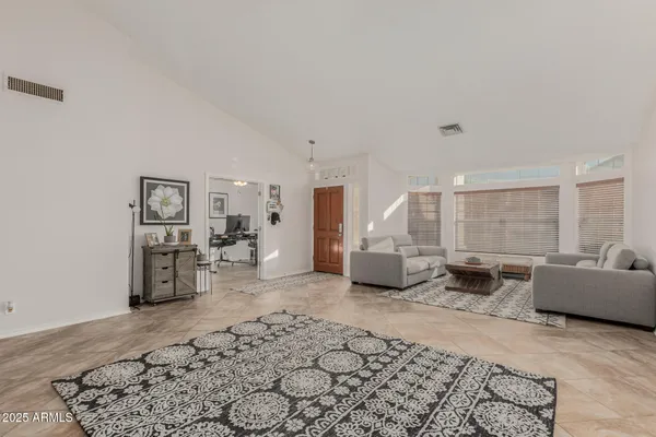 a living room with furniture and a couch
