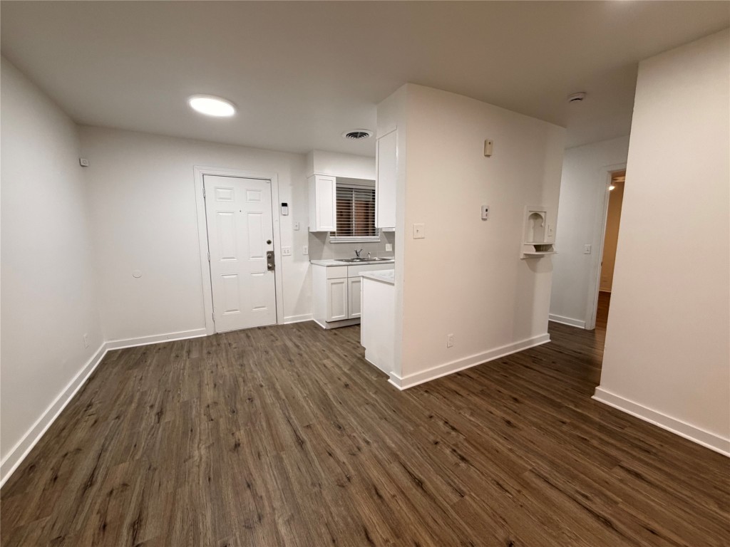 2308 Alta Vista Avenue, Unit B Austin, TX 78704 - Photo 5 of 23 a view of a kitchen with wooden floor and a sink