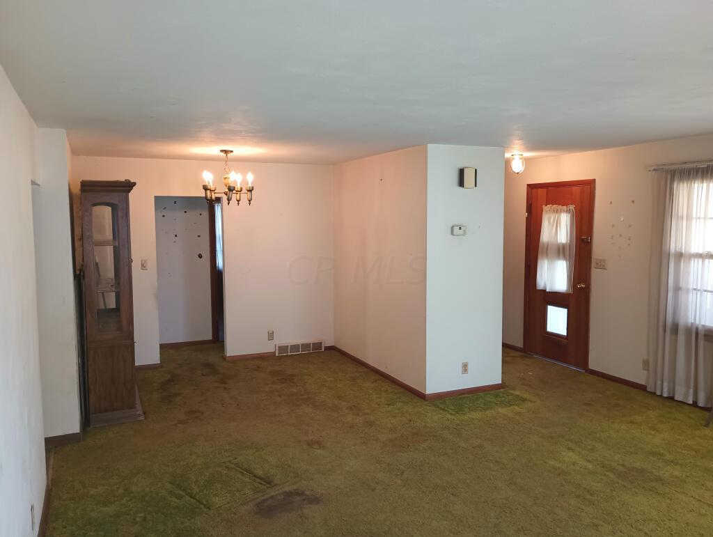 83 3rd Avenue Pataskala, OH 43062 - Photo 13 of 36 Eating space opens to spacious living room!