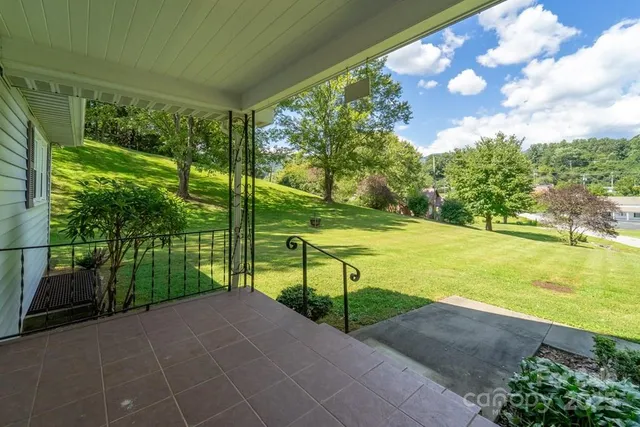 a view of a yard with an outdoor space