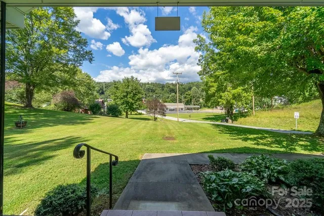 a view of a playground with a swimming pool