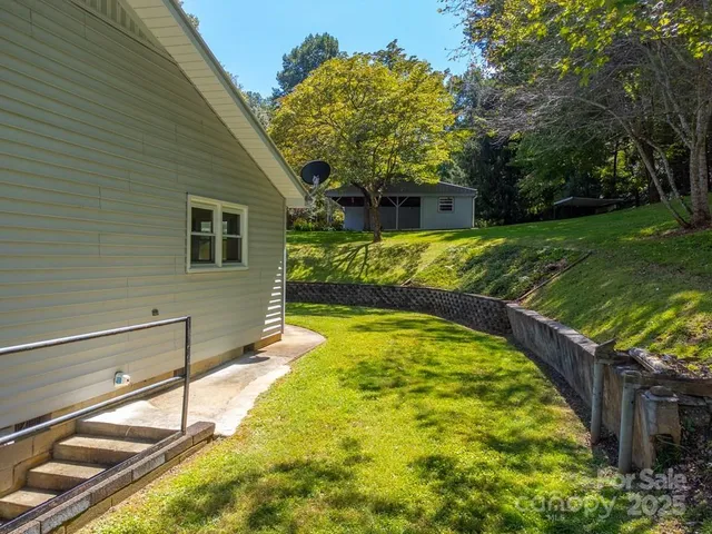 a view of a house with swimming pool