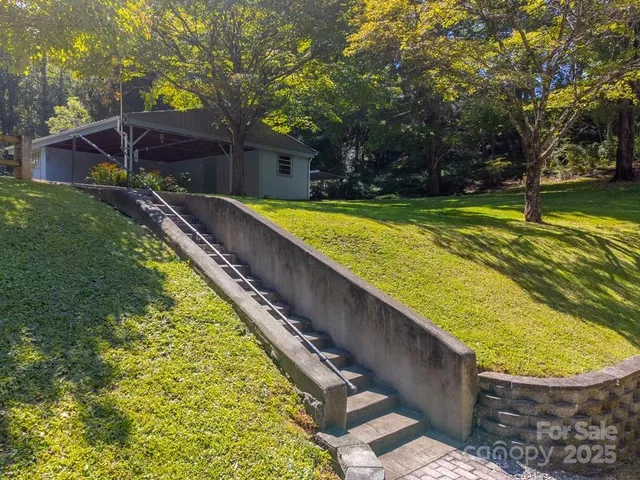 a view of swimming pool with a patio