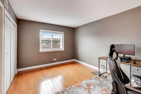 a bedroom with bed and a window