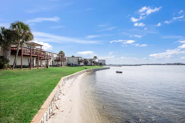 a view of a lake with a garden