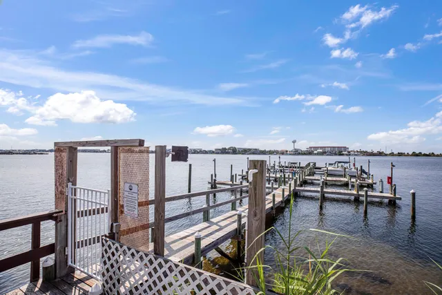 a view of a roof deck with furniture