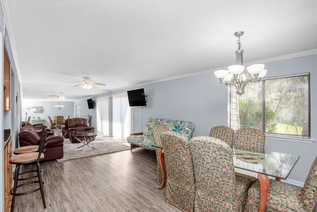 a view of a dining room with furniture