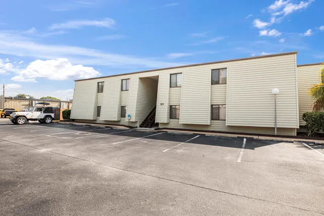 a view of a house with a street