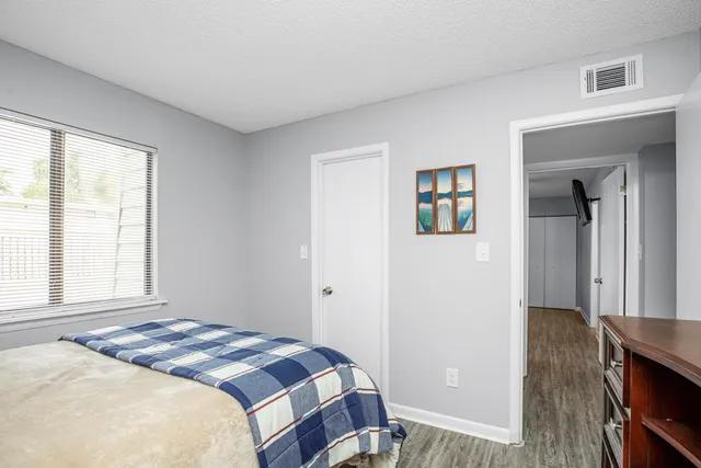 a bathroom with a sink a vanity and a mirror