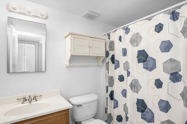 a view of storage and utility room with washer and dryer