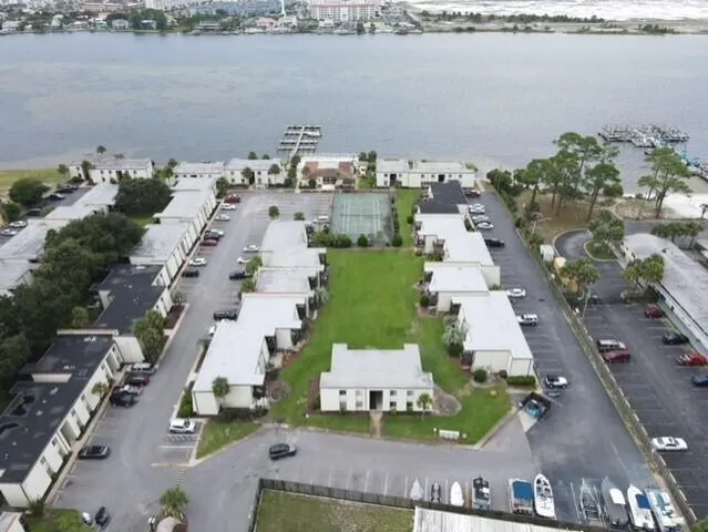 an aerial view of a house with outdoor space
