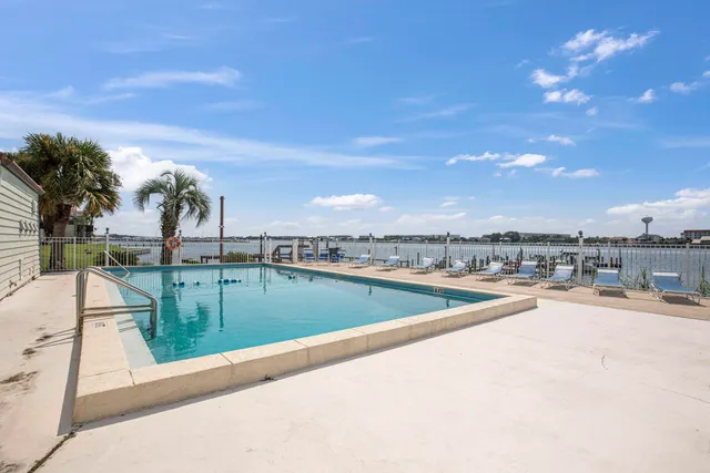 a view of a swimming pool with a terrace